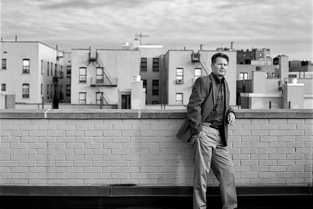 Former Executive Director, Jack Doyle stands on the roof of a Settlement Housing Fund apartment building. This photo was taken by Damon Winter for The New York Times, Mayors of New York series, first published in 2016.