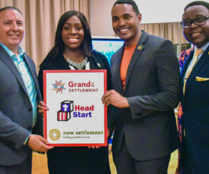 Rigaud Noel - Executive Director, Robert Cordero - CEO of Grand Street Settlement, Vanessa L. Gibson - Bronx Borough President, Ritchie Torres - Congressman, holding up a sign commemorating Head Start/Grand Street Settlement/New Settlement collaboration.